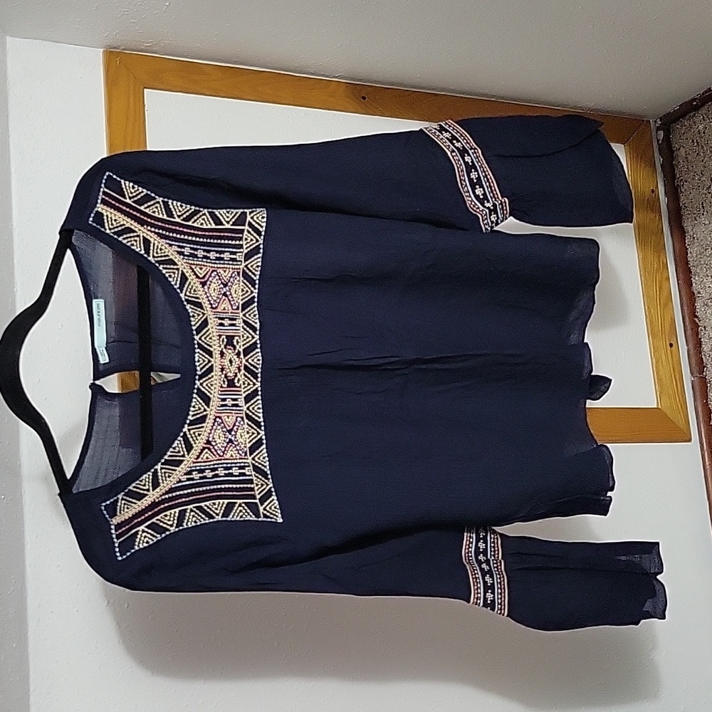 Navy blue with embroidery detail and long bell sleeves